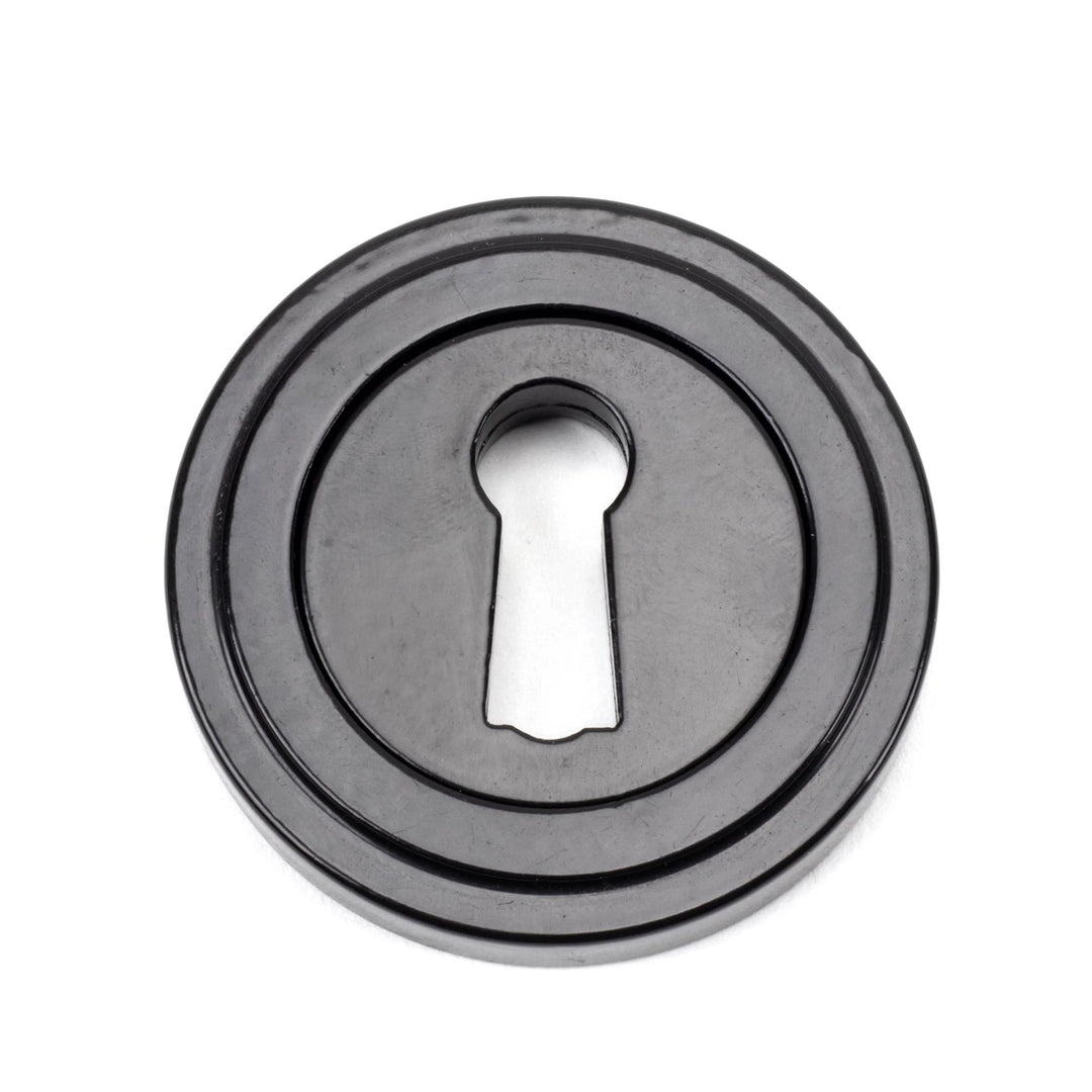 From the Anvil Art Deco Round Escutcheon - itfitz