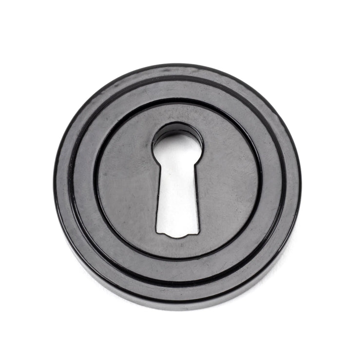 From the Anvil Art Deco Round Escutcheon - itfitz