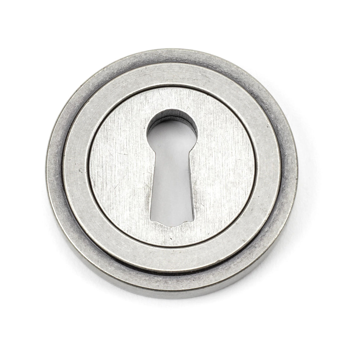 From the Anvil Art Deco Round Escutcheon - itfitz