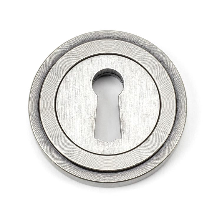 From the Anvil Art Deco Round Escutcheon - itfitz