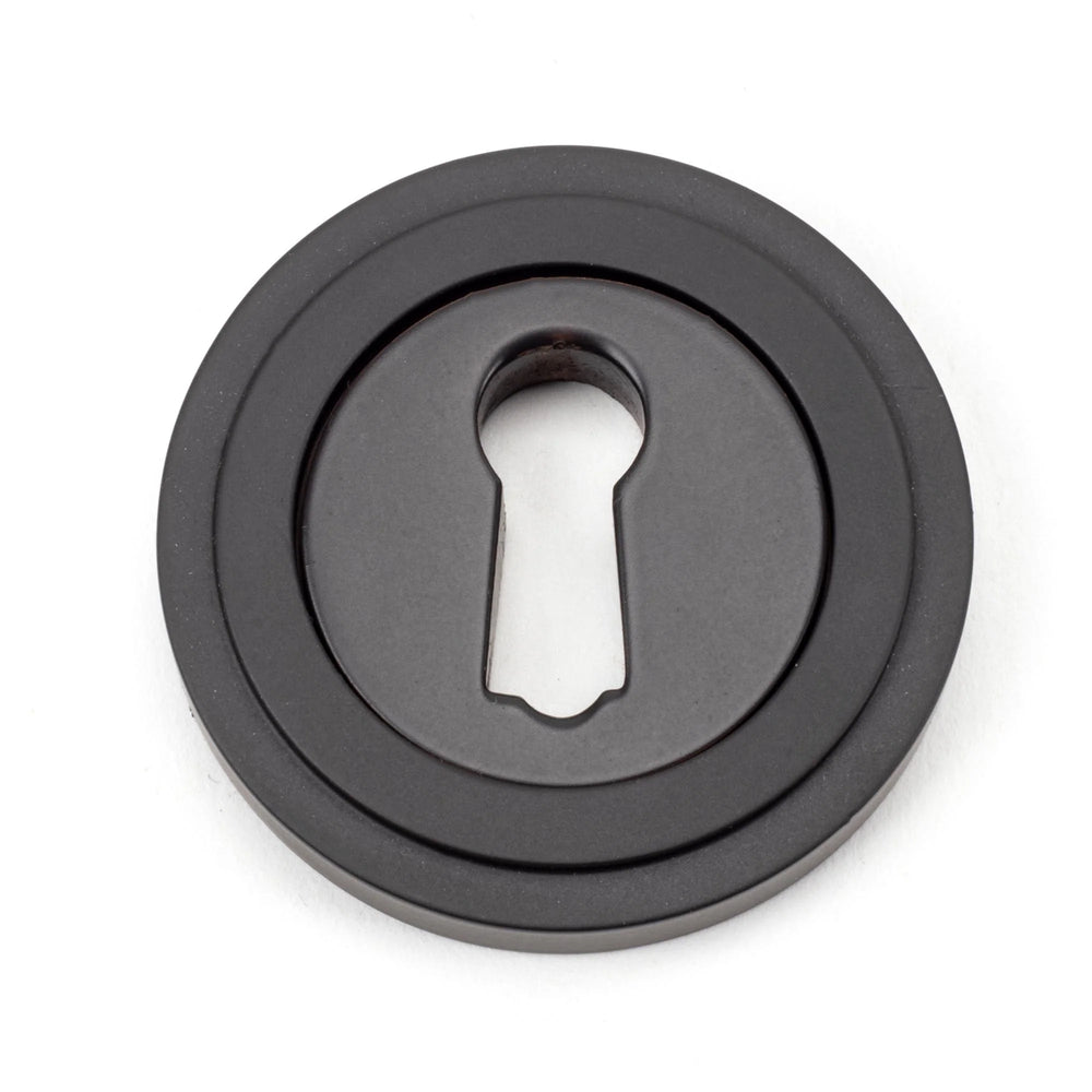 From the Anvil Art Deco Round Escutcheon - itfitz