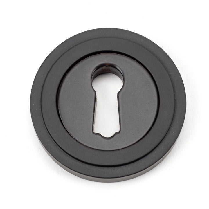 From the Anvil Art Deco Round Escutcheon - itfitz