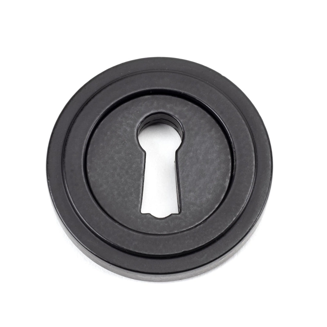 From the Anvil Art Deco Round Escutcheon - itfitz