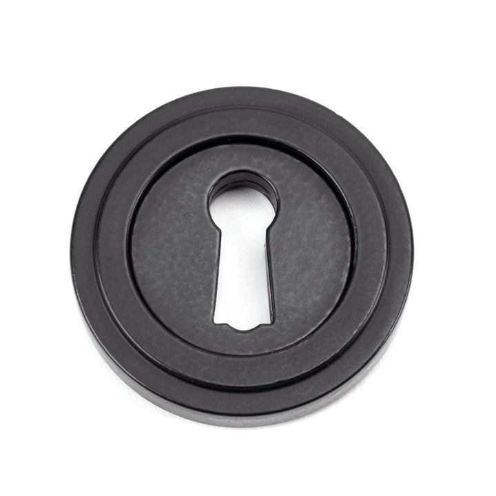 From the Anvil Art Deco Round Escutcheon - itfitz
