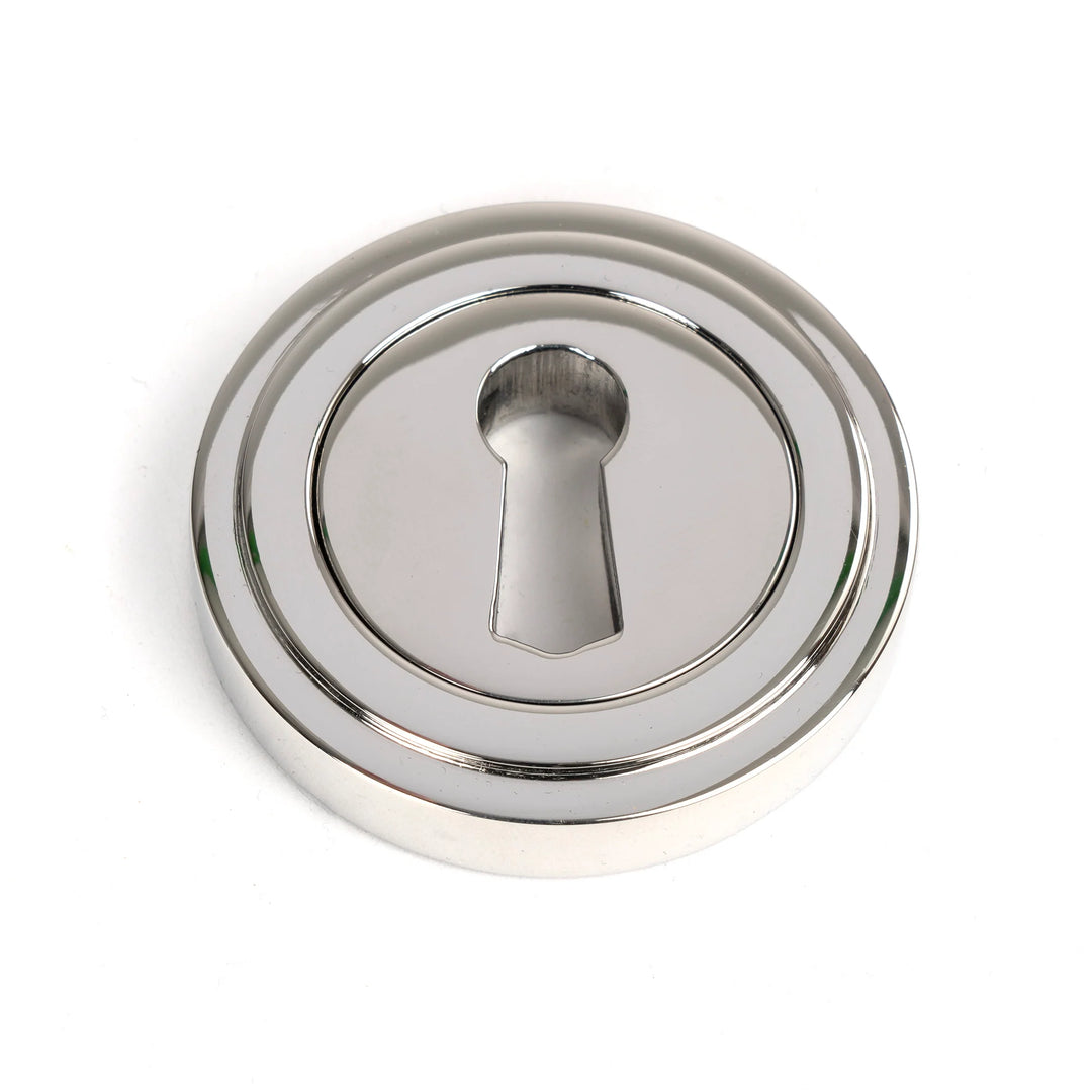 From the Anvil Art Deco Round Escutcheon - itfitz