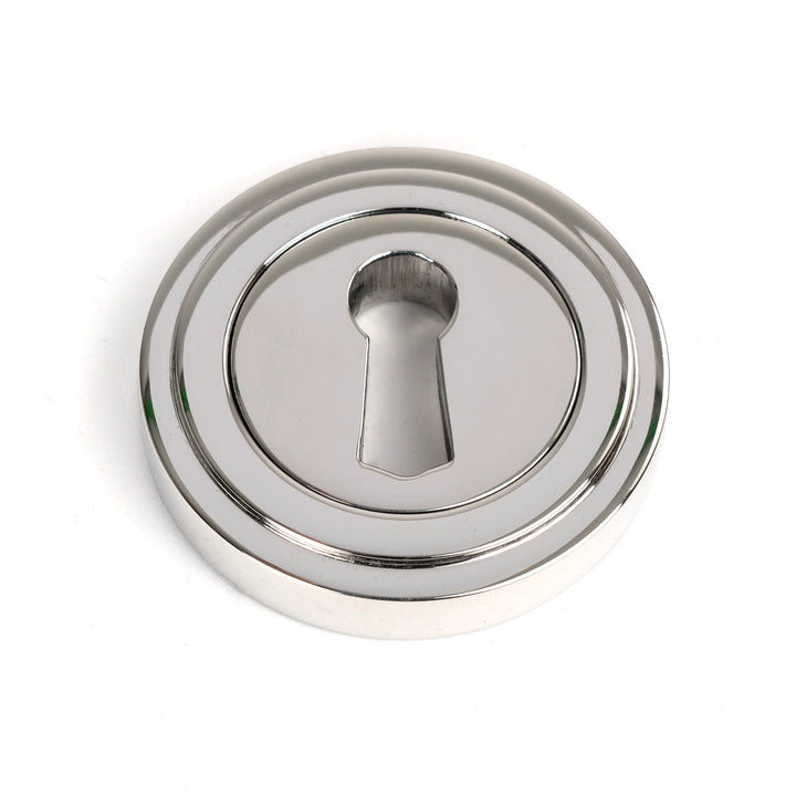 From the Anvil Art Deco Round Escutcheon - itfitz