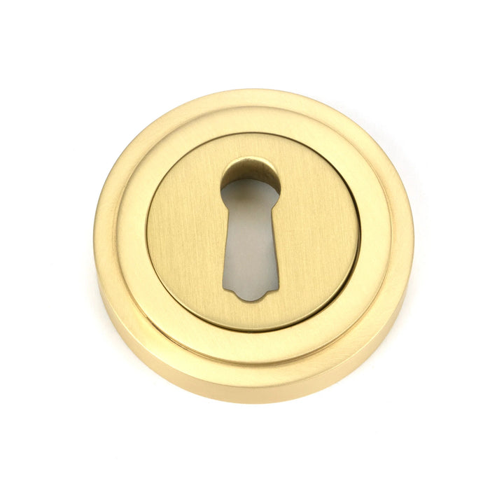 From the Anvil Art Deco Round Escutcheon - itfitz