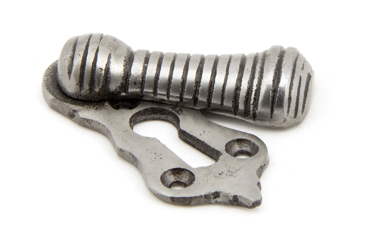 From the Anvil Beehive Escutcheon