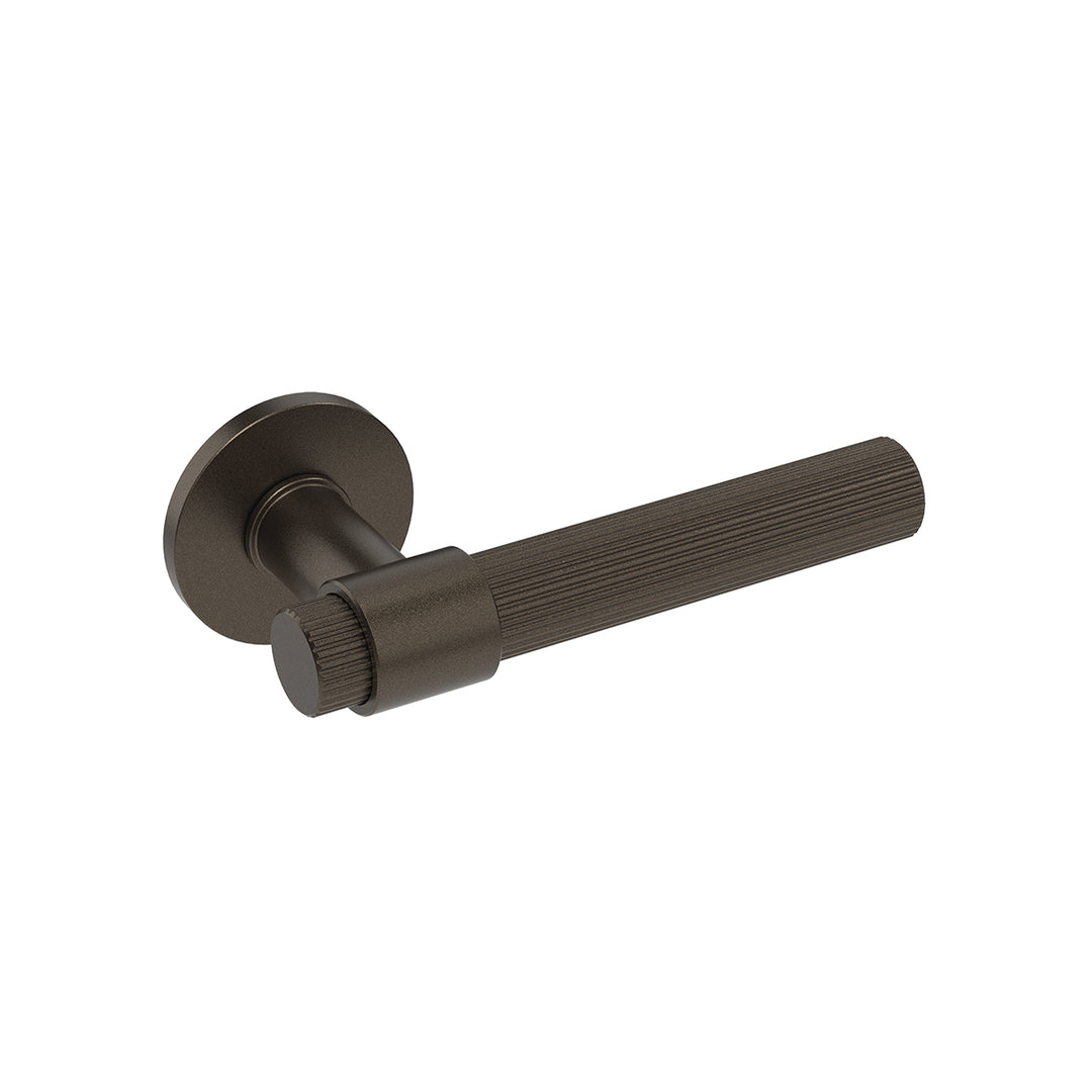 Reeded lever handle set with round backplate, dark metal finish, cylindrical grip
